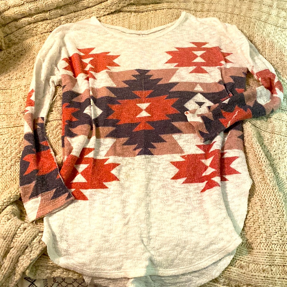 Mid thigh tunic. Perfect with leggings and boots!